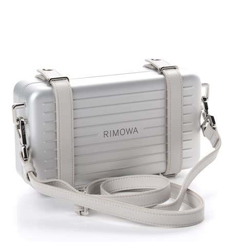 silver dior clutch